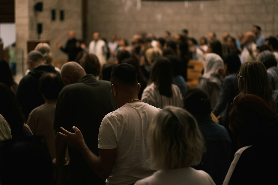 crowd of people in discussion